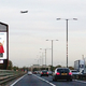 Illustration for article titled The Kids in This Billboard Point at Actual Planes Flying Overhead